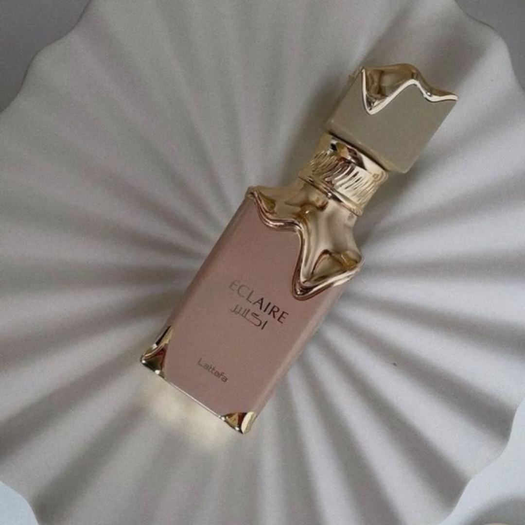 Lattafa Eclaire perfume árabe feminino doce e sofisticado. Essência envolvente com flores, baunilha e almíscar. Fixação intensa e luxuosa.