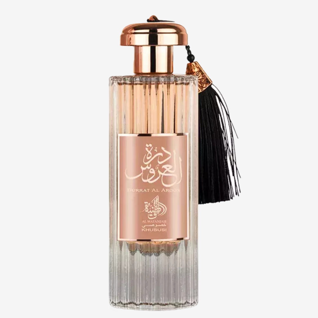 Durrat Al Aroos Al Wataniah perfume árabe feminino luxuoso, doce e floral, com fixação intensa. A fragrância perfeita para noites marcantes.